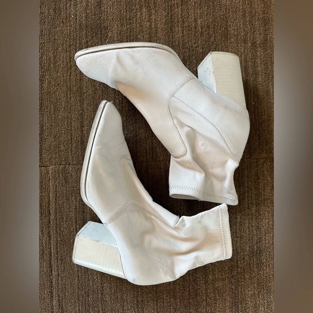 Intentionally blank white booties